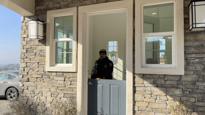 Millennial Security Inc. concierge security officer monitoring the entrance of a residential community in Southern California